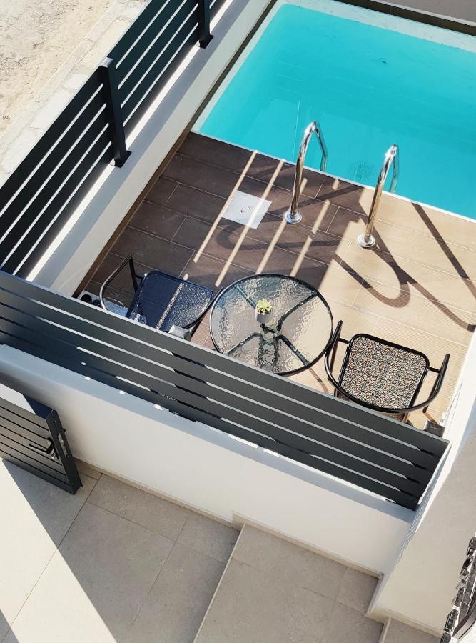 Aelia Seaside Luxury Suites Nea Karvali Exteriör bild